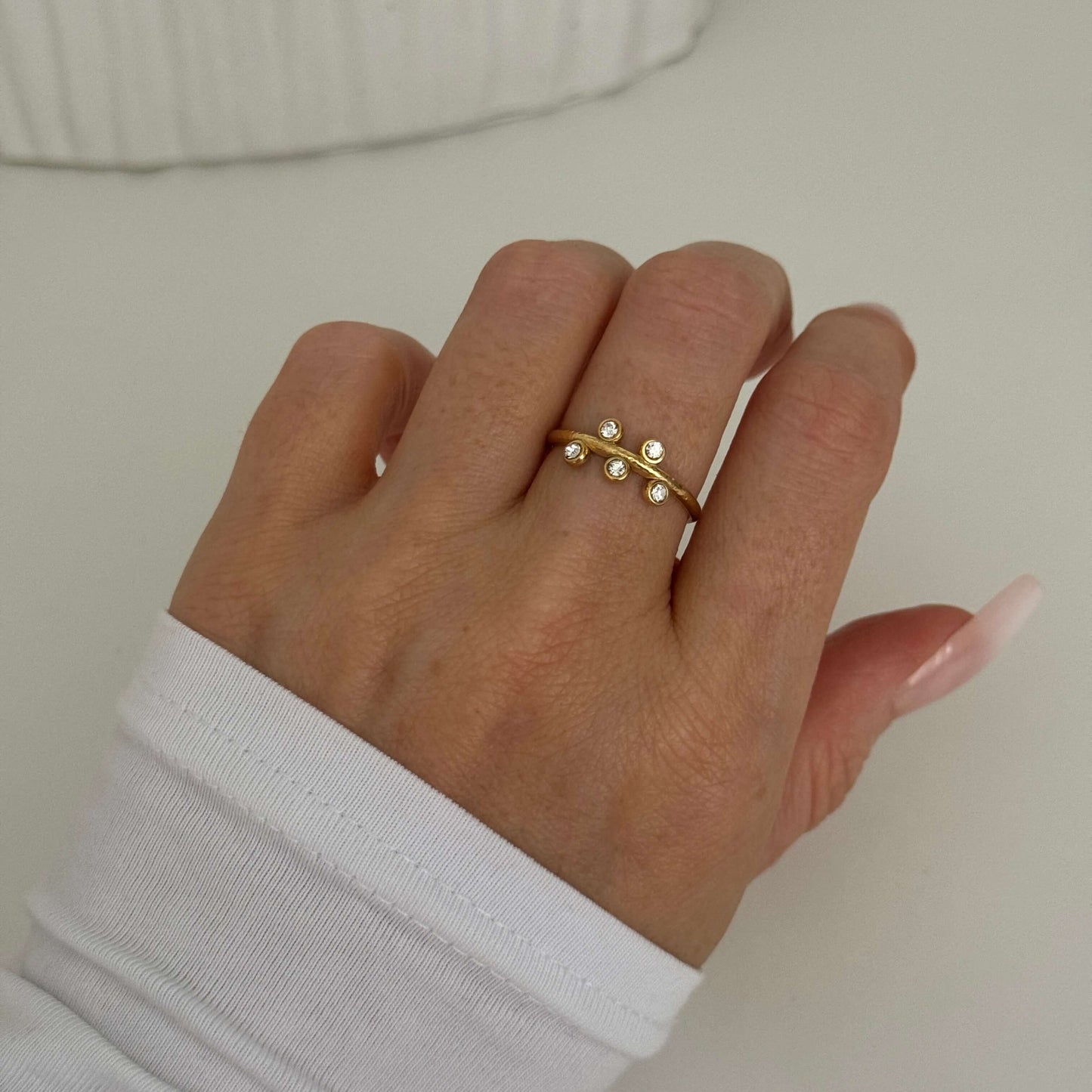 Starlight Sparkle Gold Adjustable Ring adorned with clear zirconia stones, by Kataleya.