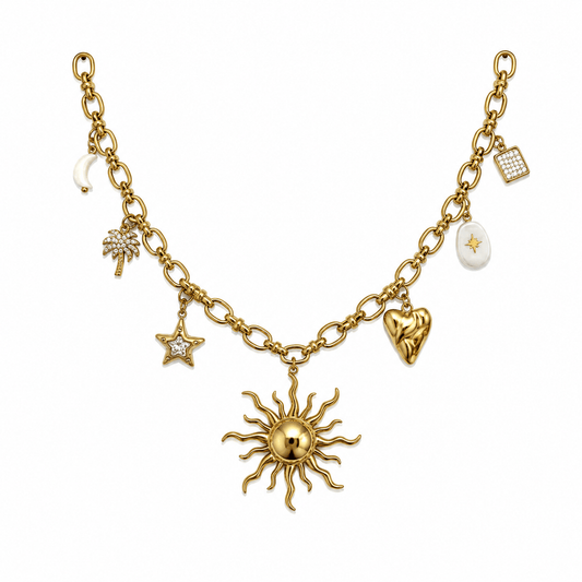 Hemera Charm Necklace featuring gold sun and celestial charms, embodies warmth and joy of summer days.