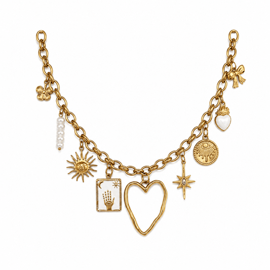 Althea Charm Necklace featuring gold charms including a sun, heart, and pearl, emphasizing its significance as a charm necklace.