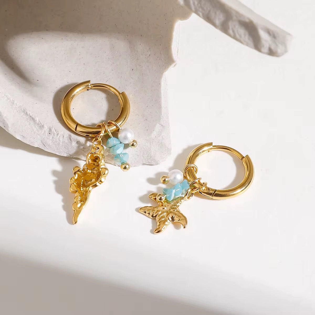 Ocean Earrings, featuring amazonite stones, seashell and starfish, in gold by Kataleya Jewellery