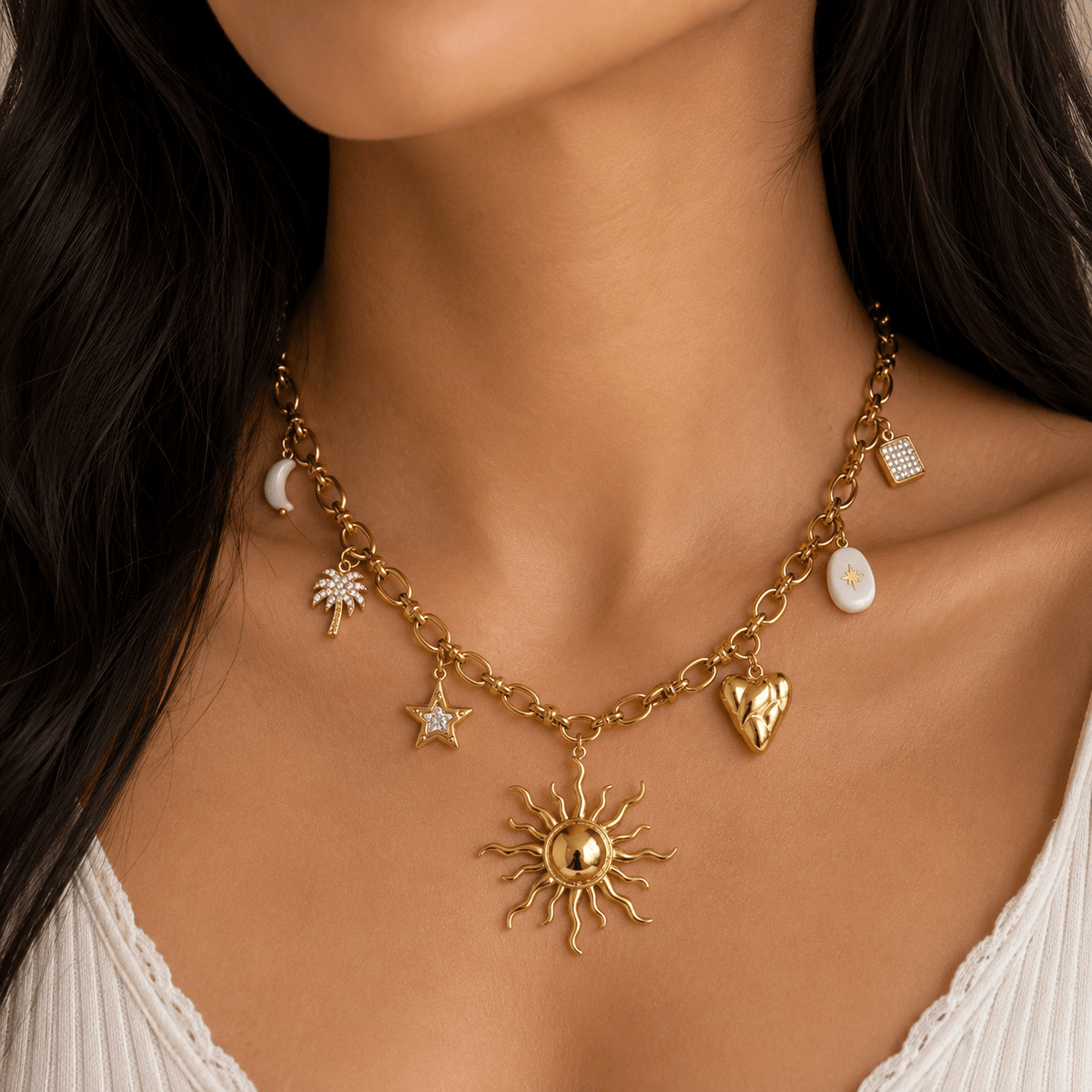 Gold sun and celestial charm necklace featuring various charms, perfect for adding a unique touch to any outfit. Charm Necklace.