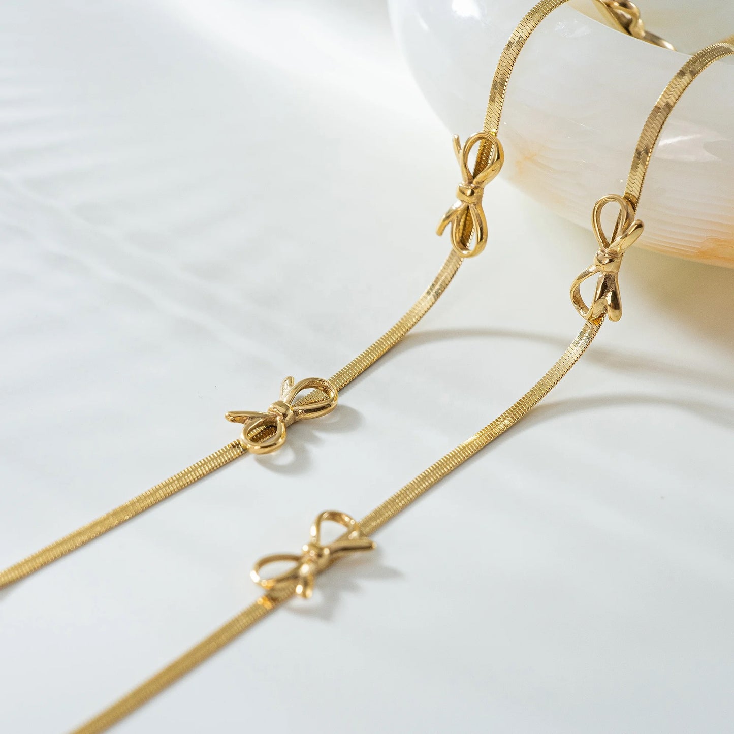 Gold Bow Necklace Snake Chain by Kataleya