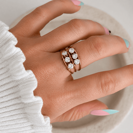 Gold Adjustable Crystal Ring featuring radiant cubic zirconia stones on a hand with light-catching finish.
