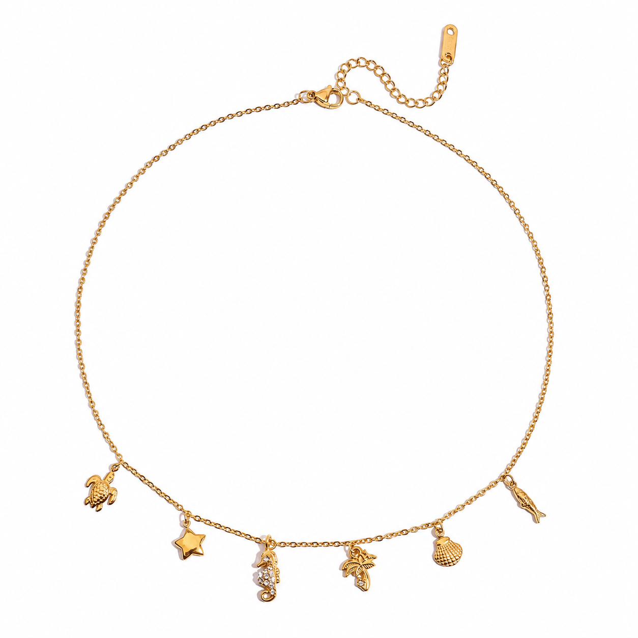 Gold Coastal Charm Necklace featuring ocean-inspired charms like a turtle, starfish, seahorse, and seashell.