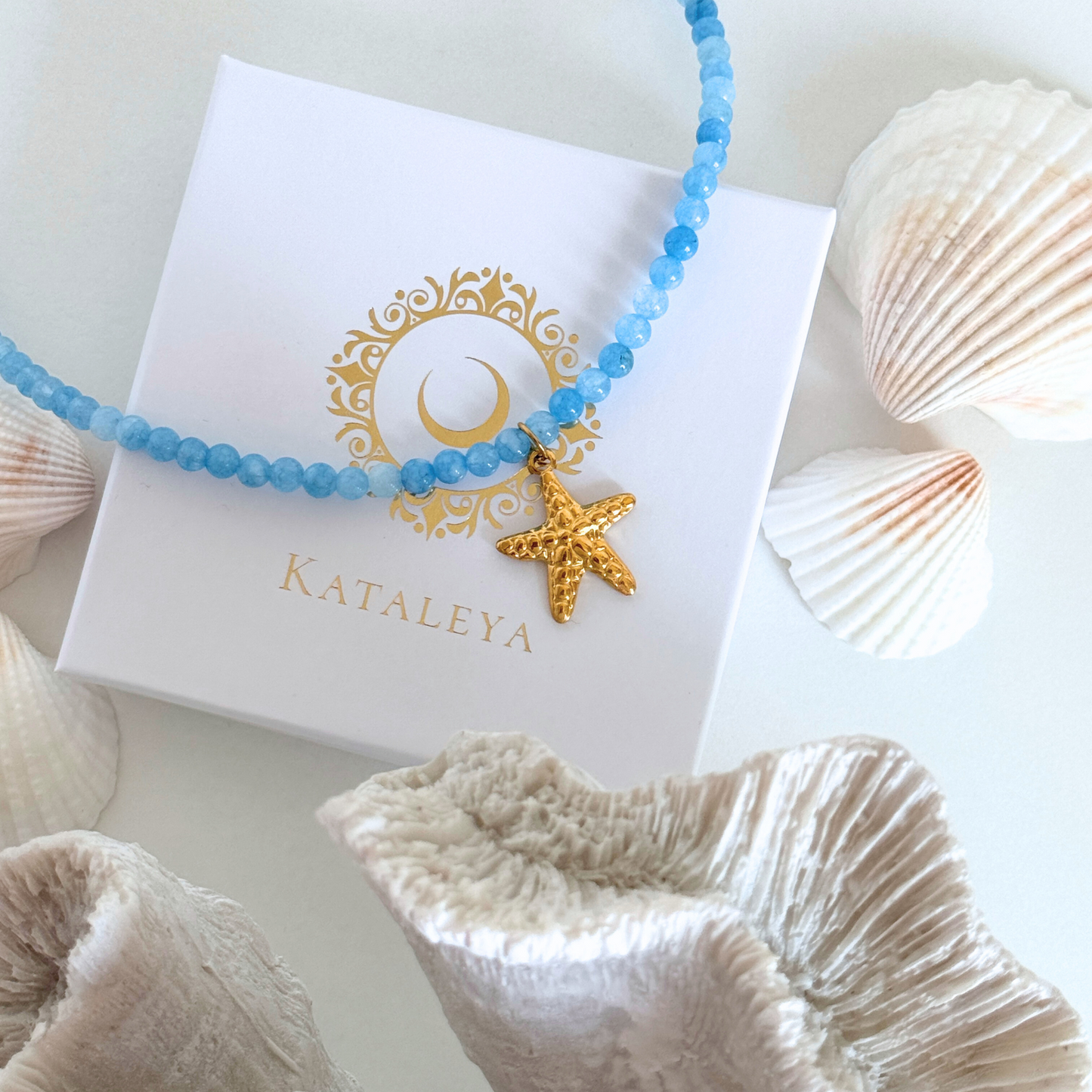 Blue Beaded necklace with gold starfish charm, handmade by Kataleya Jewellery