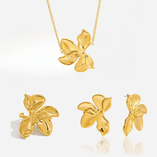 Gold Flower Jewelry set featuring a sculptural floral necklace and matching earrings, waterproof and hypoallergenic.