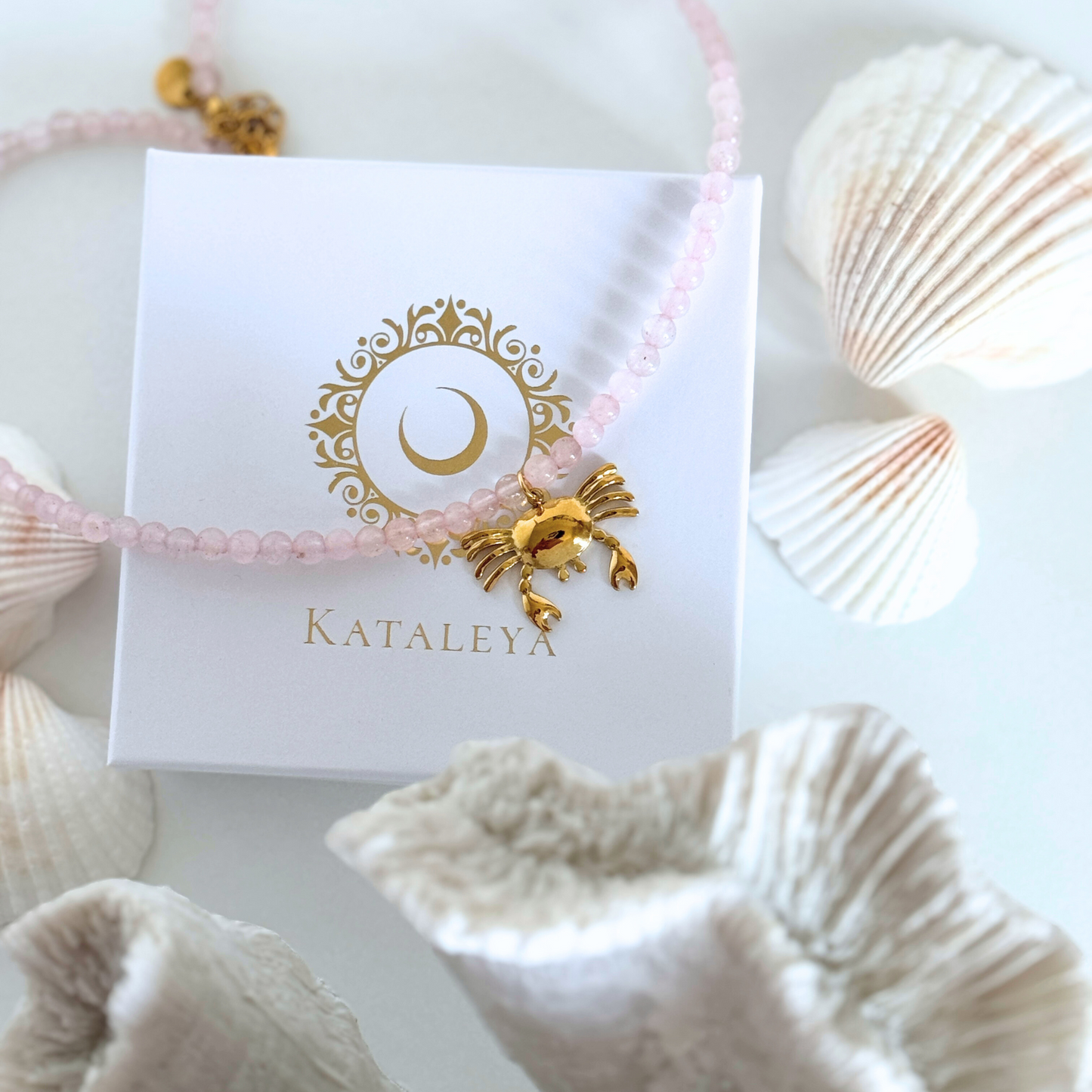 Golden Crab Tide Necklace, pink beaded necklace with a gold crab charm, handmade by Kataleya Jewellery