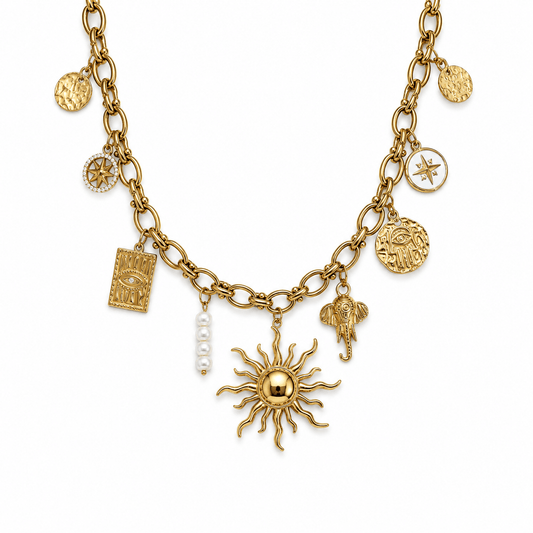 Helia Charm Necklace featuring sun, Hamsa, compass, elephant, and pearls, a stunning charm necklace for meaningful style.