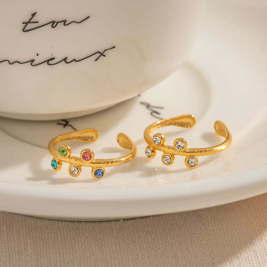 Starlight Sparkle Gold Adjustable Ring adorned with clear or colorful zirconia stones, by Kataleya.