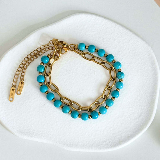 Waterproof Bracelet featuring gold chain and turquoise beaded design, stylish and hypoallergenic for everyday wear.