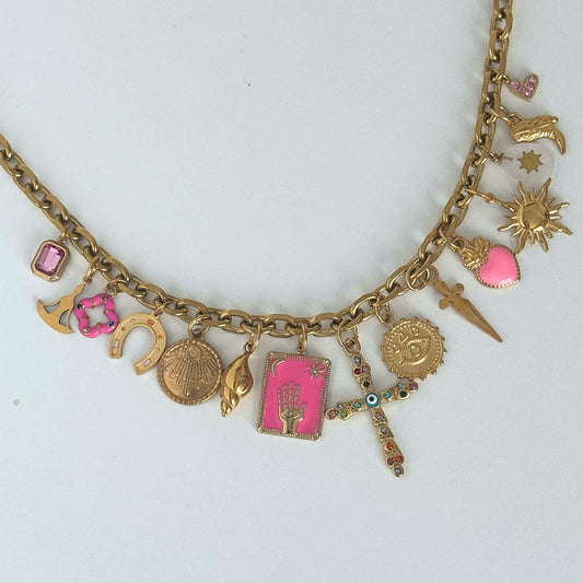 Pink charm necklace featuring a chunky gold chain with 15 delicate pink and gold charms, designed by Kataleya.