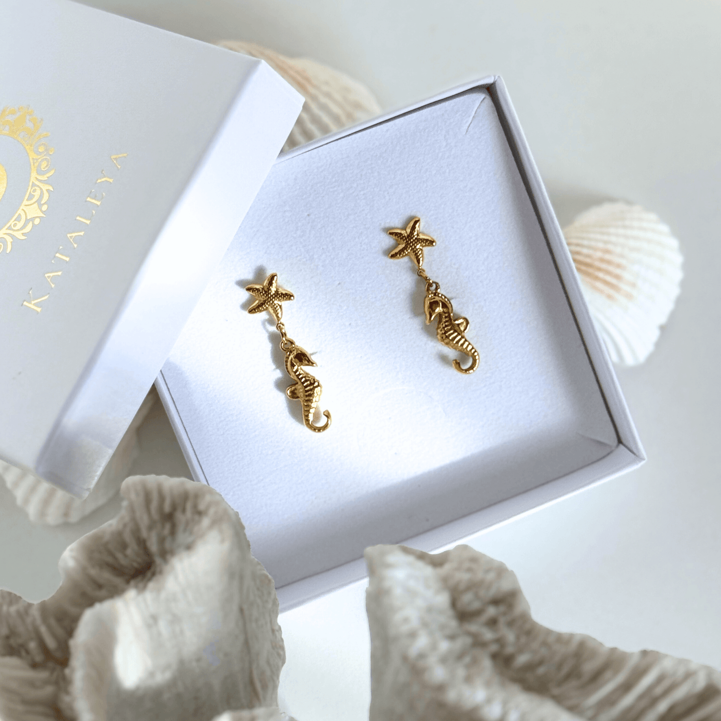 Gold Seahorse and Starfish Drop Earrings by Kataleya Jewellery