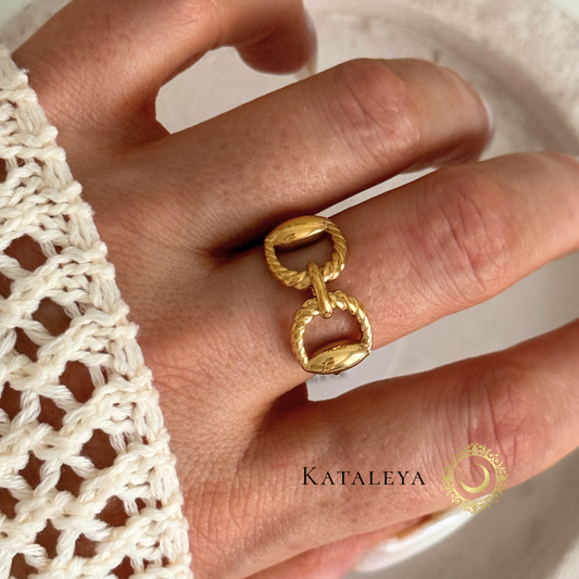 Twist Chain Ring worn on a hand, showcasing its waterproof, tarnish-free design and elegant style.