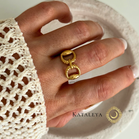 Twist Chain Ring worn on a hand, showcasing its waterproof and tarnish-free design in 18ct gold plated stainless steel.