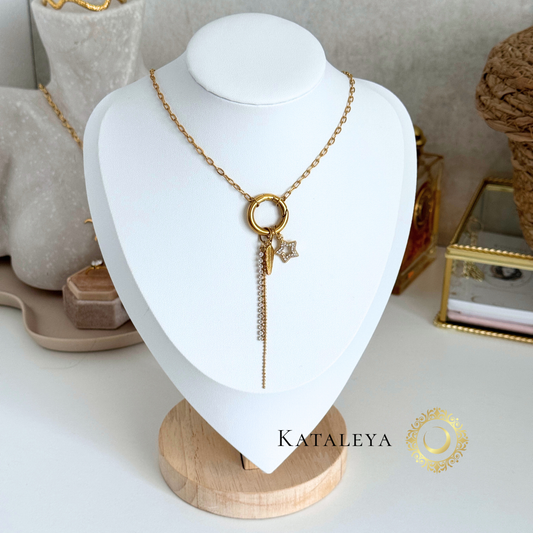 Celestial Long Charm Necklace displayed on a bust, featuring a golden star and feather charm.