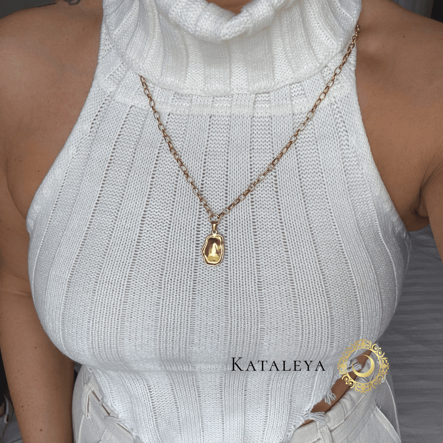 Model wearing the Abstract Muse Long Necklace with a smooth, irregular pendant, showcasing style and artistry.