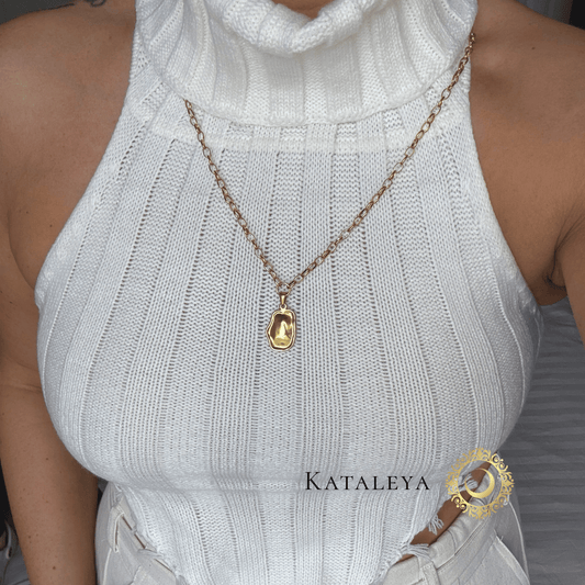 Model wearing the Abstract Muse Long Necklace with a smooth, irregular pendant, showcasing style and artistry.