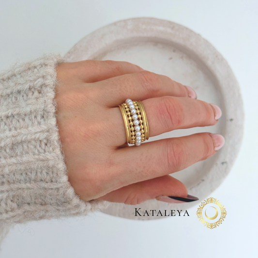 Aura Pearl Band Ring worn on hand, showcasing waterproof jewellery design with pearl accents.