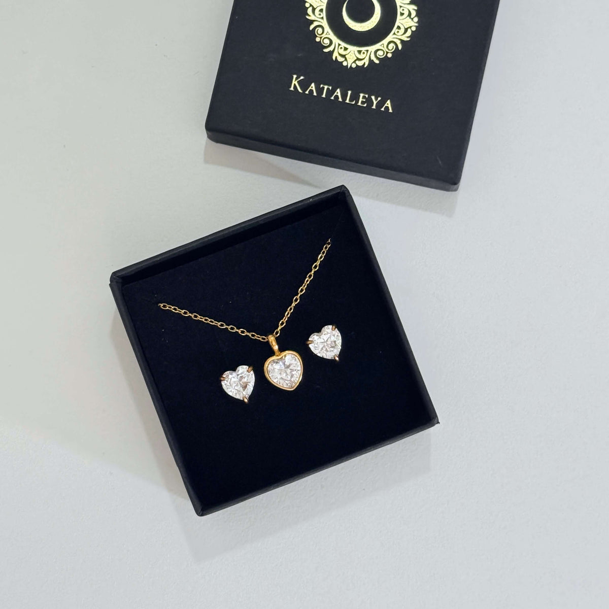 Gold heart necklace with cubic zirconia in a gift box by Kataleva, waterproof PVD stainless steel jewellery.