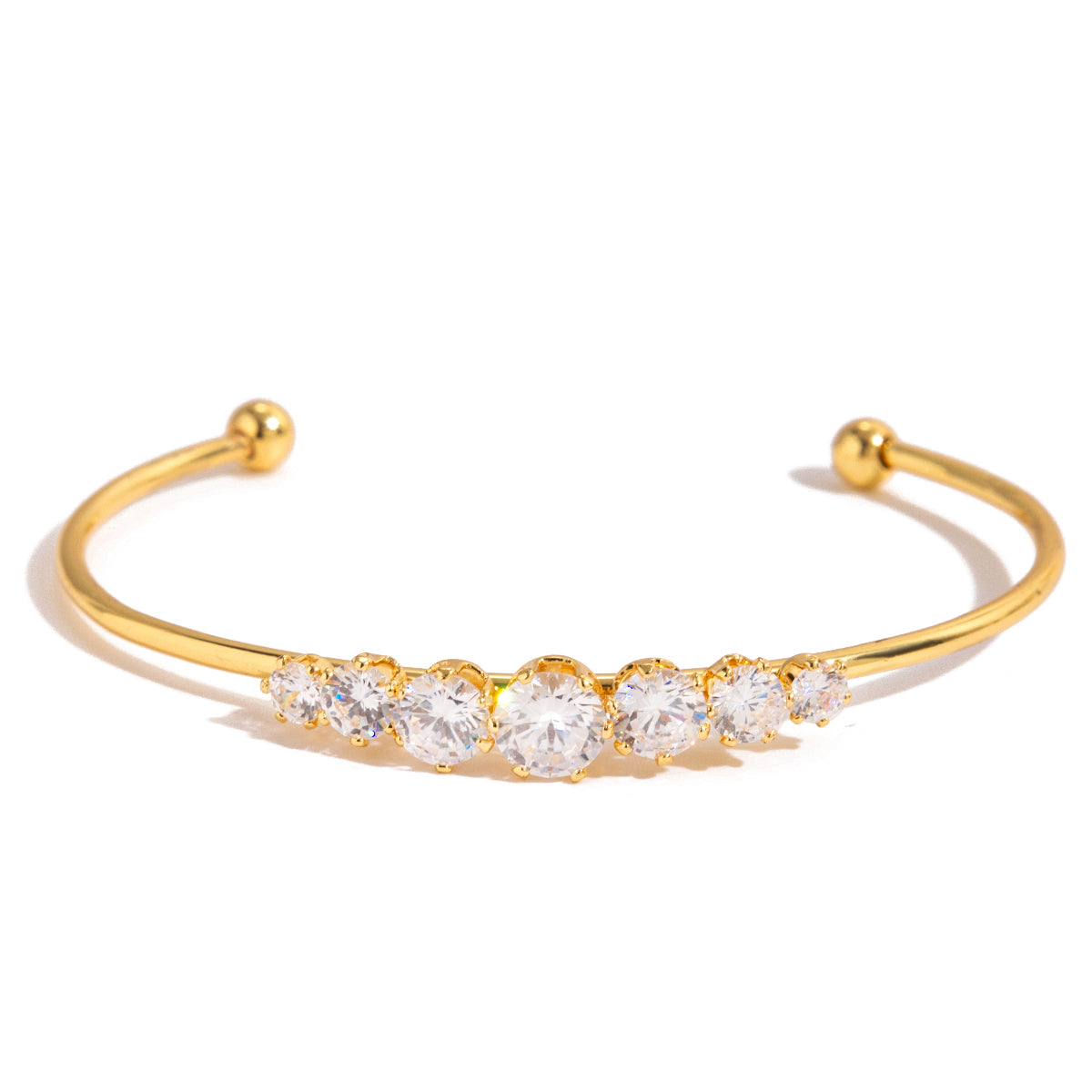 Elegant gold Crystal Line Bangle featuring high-clarity zirconia stones for a touch of sophistication.
