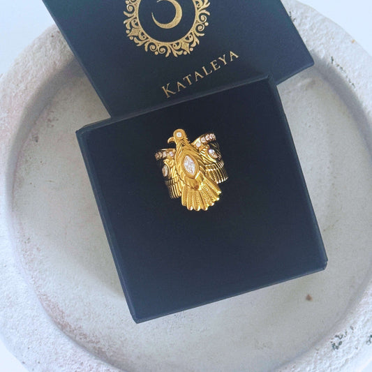 Nekhbet eagle statement ring displayed in elegant packaging, showcasing its bold design and craftsmanship.