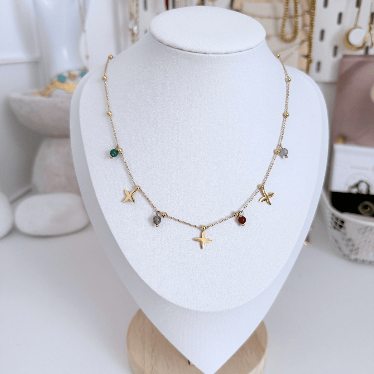 Huacachina Necklace - Colourful Beaded Necklace with gold and colourful beads, featuring star shapes and vibrant gemstones.