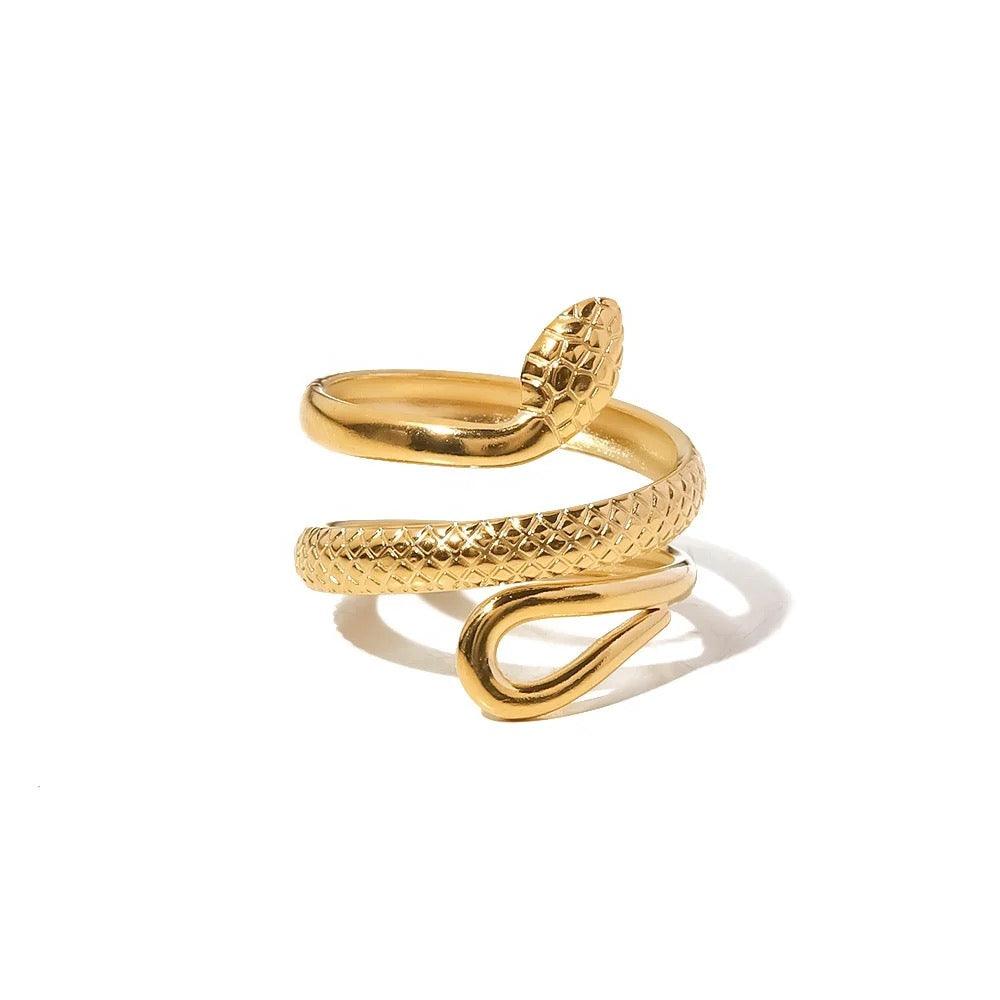 Gold snake ring made of 18ct gold plated stainless steel with intricate design and texture.
