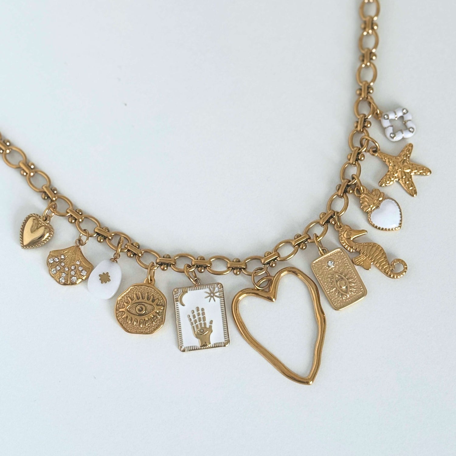 Gold and white multi charm necklace by Kataleya Jewellery