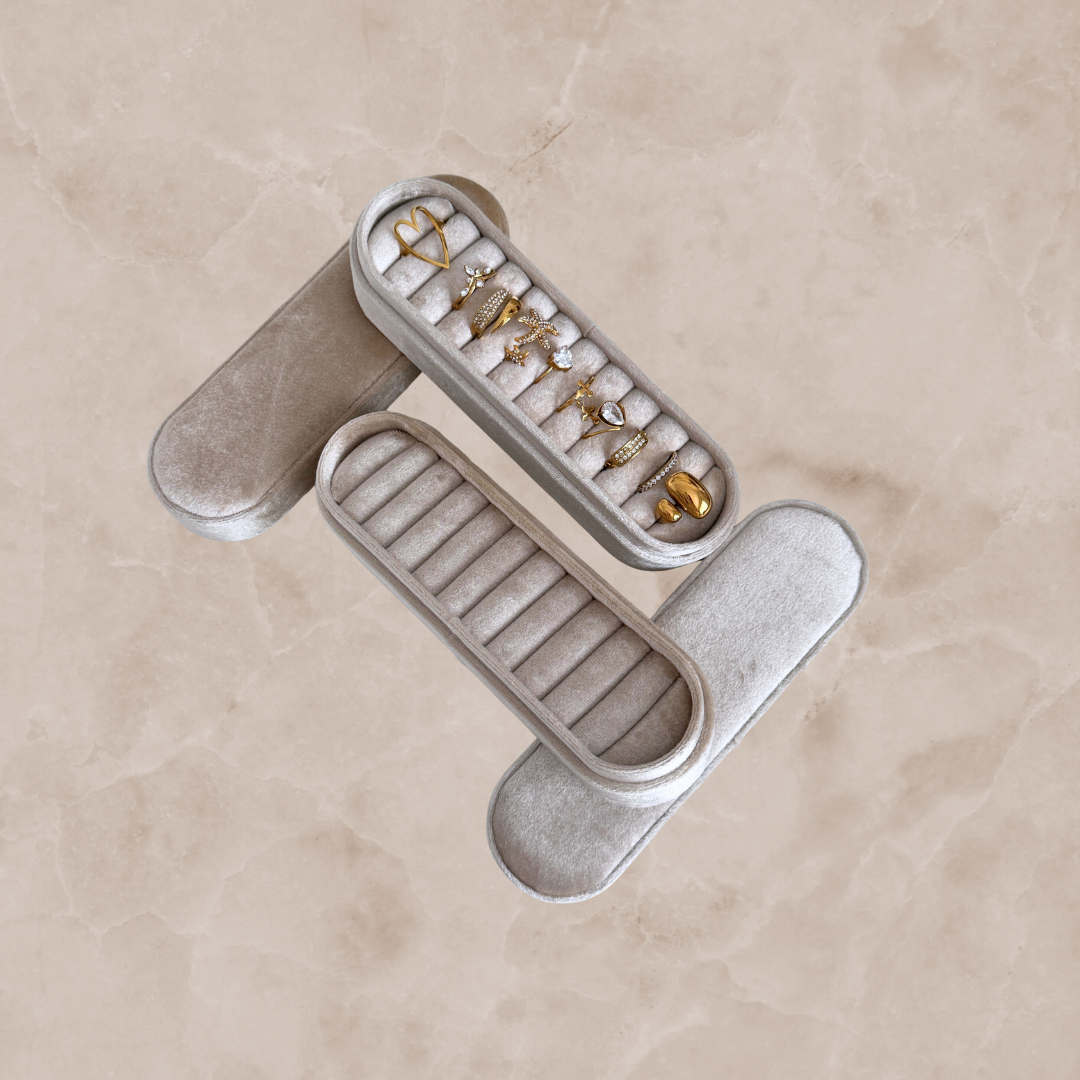 Elegant jewelry accessories displayed in a chic jewelry box, perfect for organizing rings and earrings.