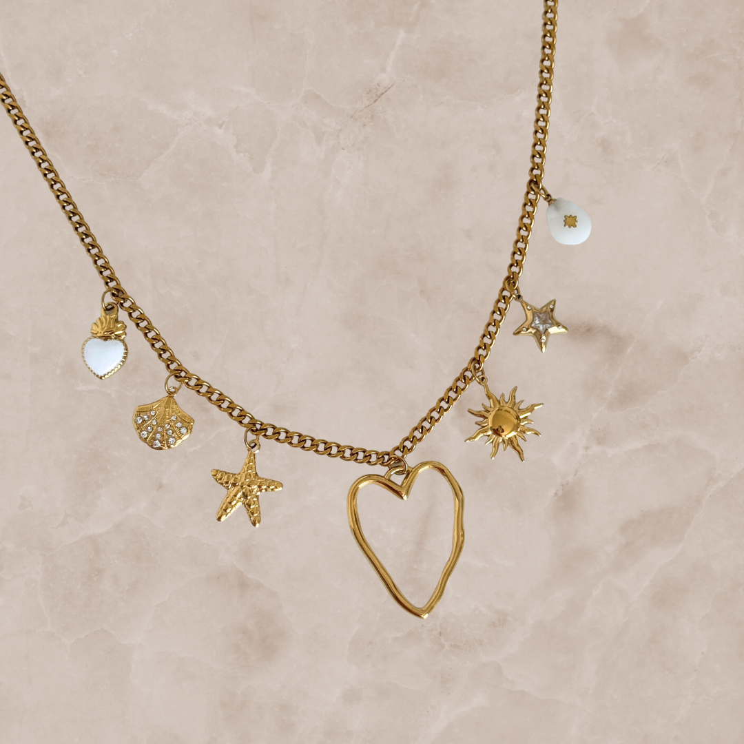 Gold and white multi charm necklace by Kataleya Jewellery