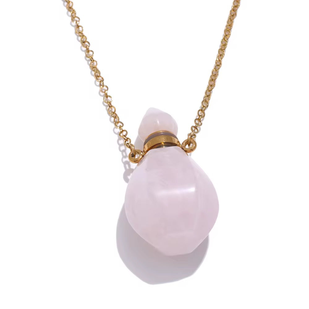 Tide Essence Parfum, Potion Bottle , Rose Quartz Necklace by  Kataleya Jewellery