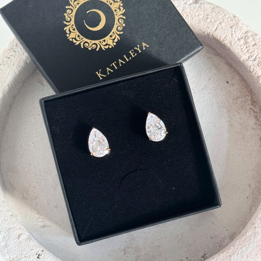 Large Teardrop CZ Stud Earrings in an elegant box with brand logo, showcasing their sparkling clarity and design.