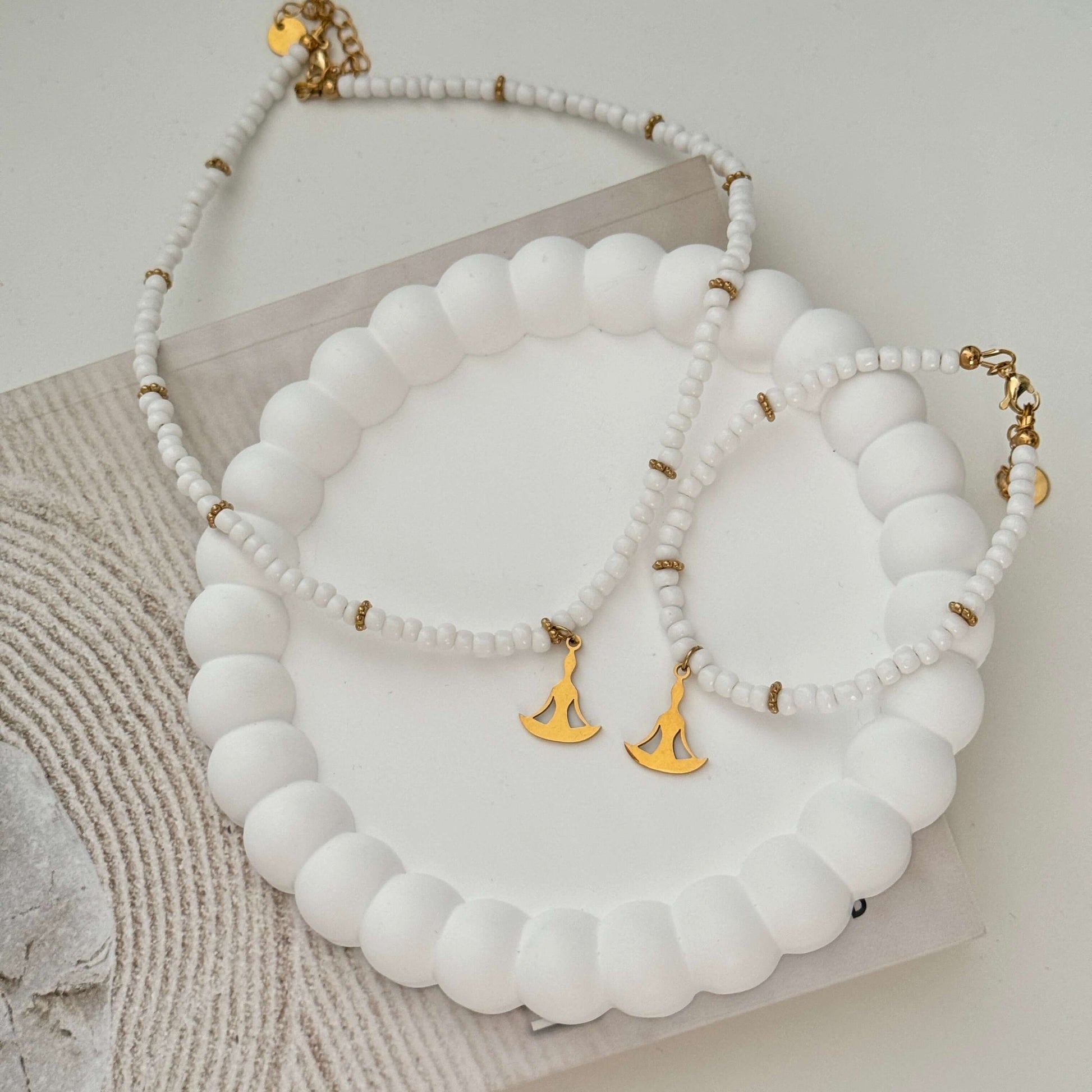 Serene Balance Bracelet and Necklace  - Gold Yoga Pose Pendant on a White and Gold Beaded String by Kataleya