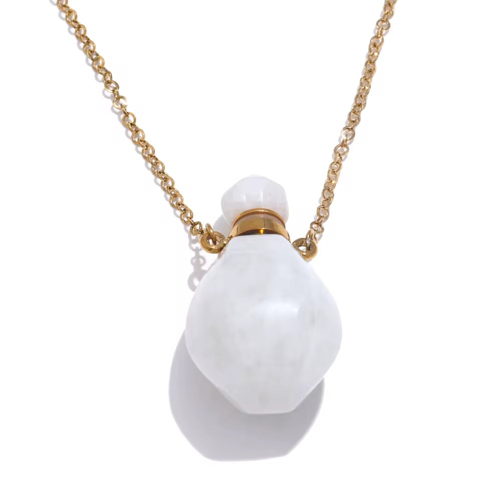 Tide Essence Parfum, Potion Bottle , White Crystal Necklace by  Kataleya Jewellery