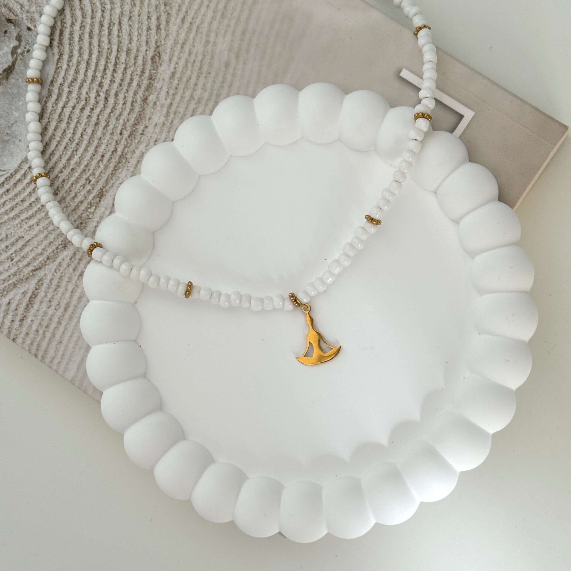 Serene Balance Necklace - Gold Yoga Pose Pendant on a White and Gold Beaded String by Kataleya