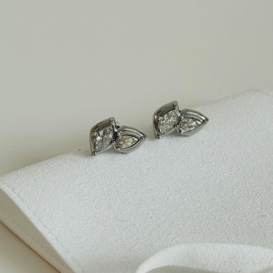 Irregular 2 Leaf Zircon Stud Earrings in Silver by Kataleya