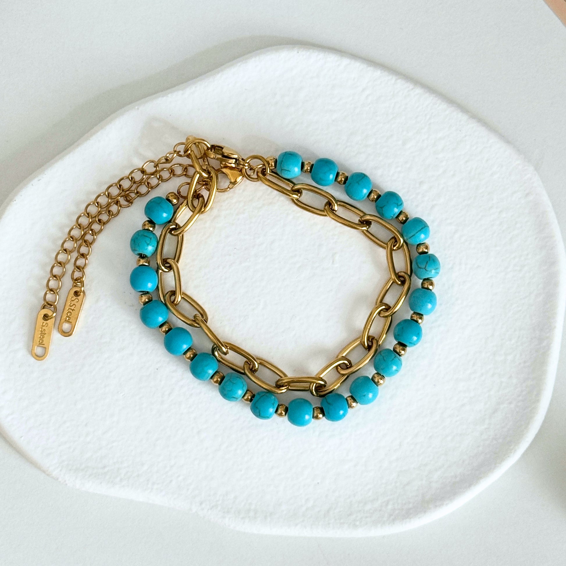 Waterproof Bracelet featuring gold chain and turquoise beaded design, stylish and hypoallergenic for everyday wear.