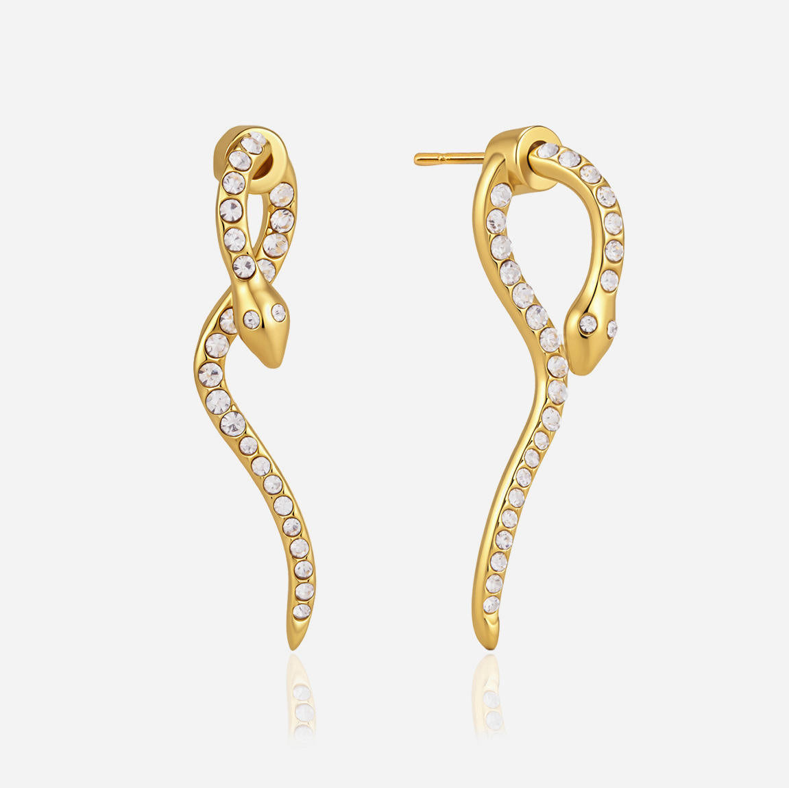 Serpent Earrings featuring a long S-curve design with pavé set crystals and smooth polished gold head.