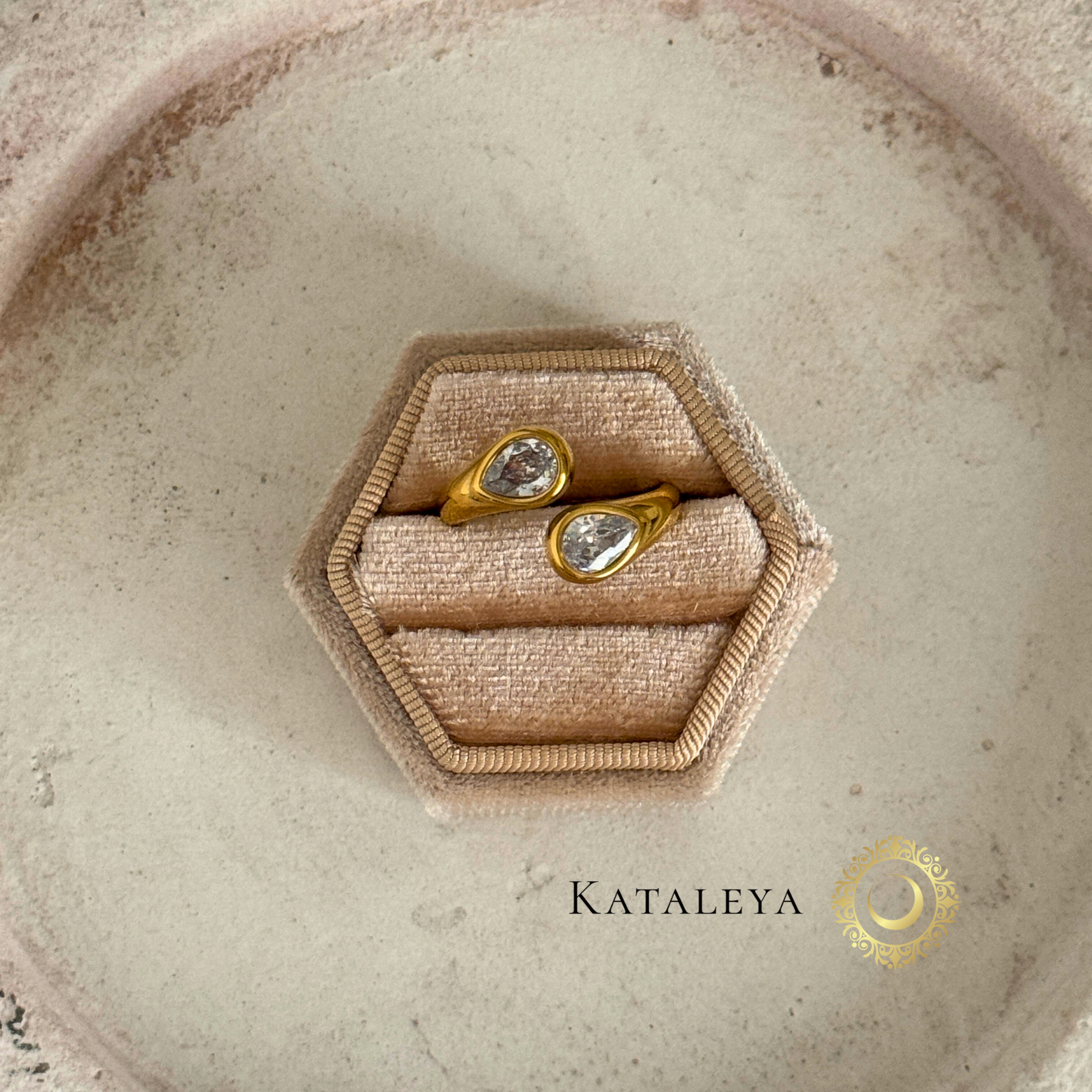 Twin Sparkle Wrap Ring featuring two teardrop zircon stones in 18ct gold plated setting, waterproof and tarnish-free.