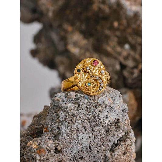 AlUla Gold Hammered Ring adorned with a moon, eye, star, and colorful stones by Kataleya.