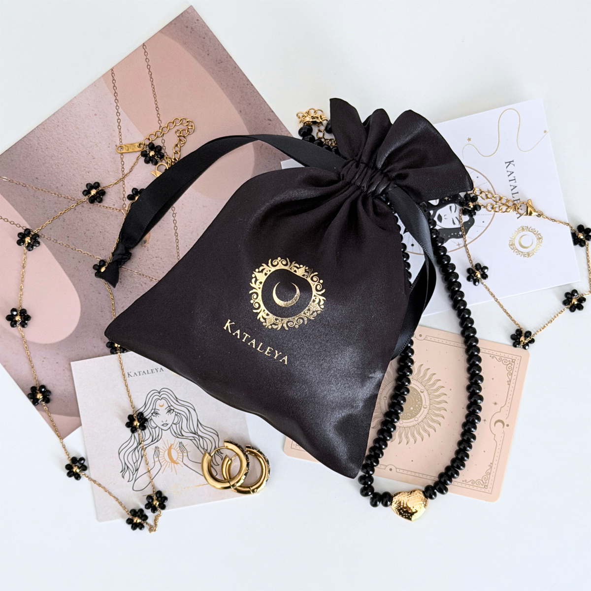 Black Kataleya mystery bag - four waterproof gold-plated pieces including black beaded jewellery