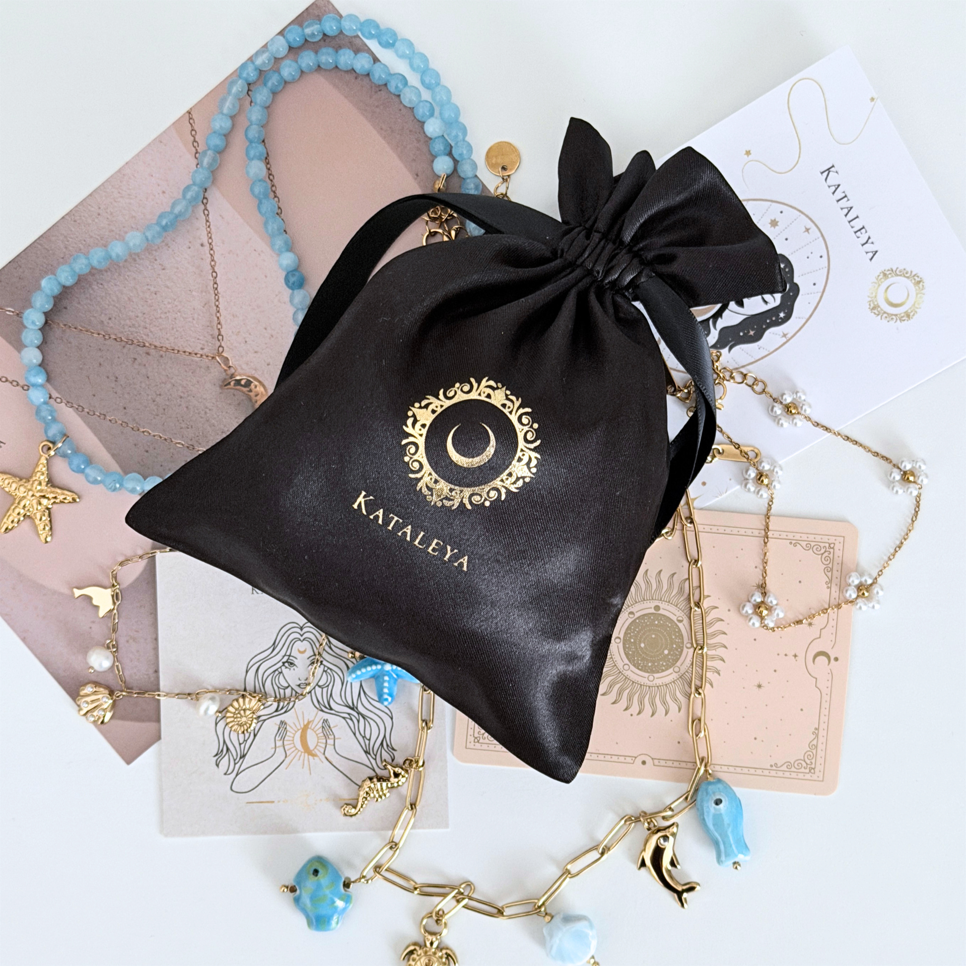 Blue Kataleya mystery bag - four waterproof gold-plated pieces including blue beaded jewellery