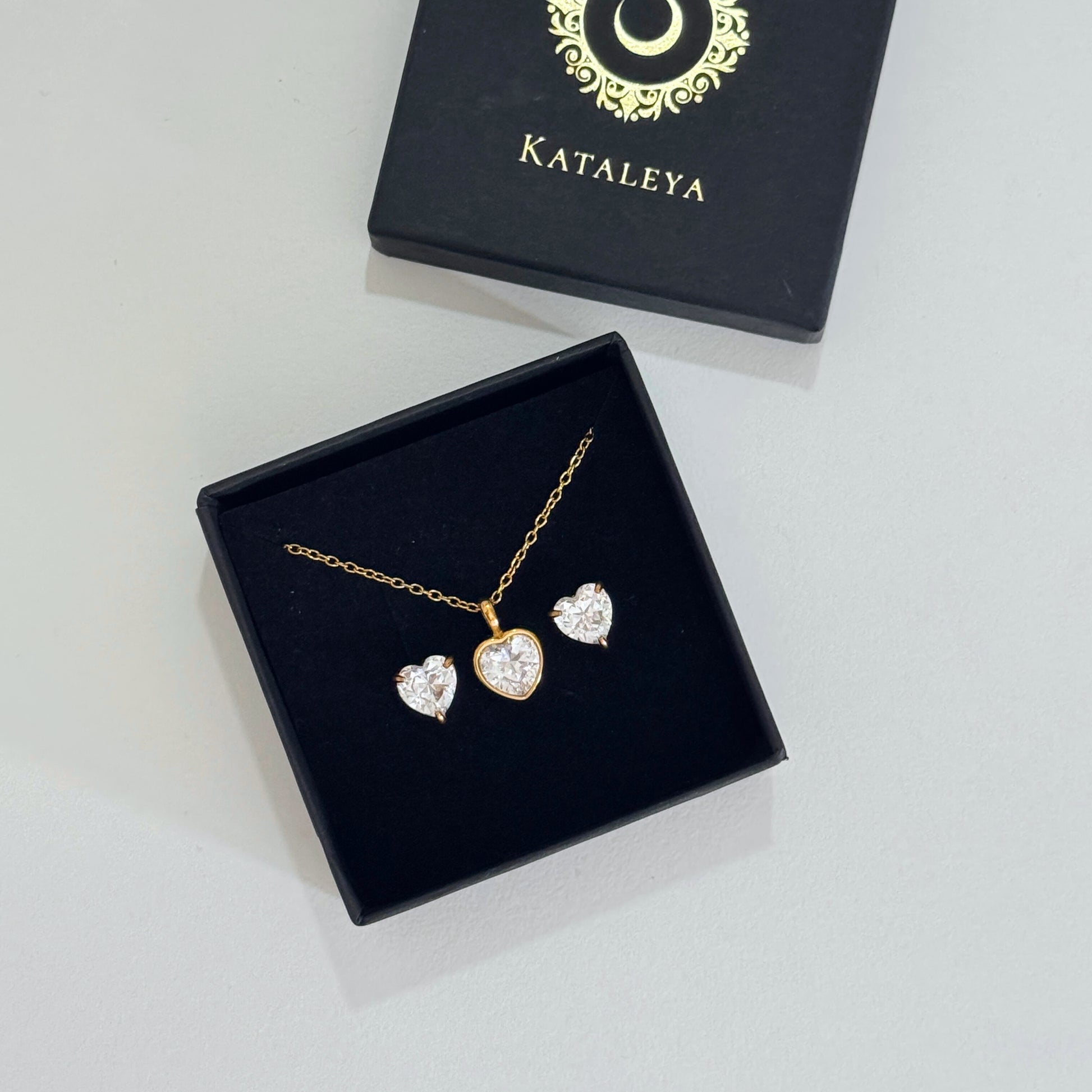 Gold heart necklace with cubic zirconia in a gift box by Kataleva, waterproof PVD stainless steel jewelry.