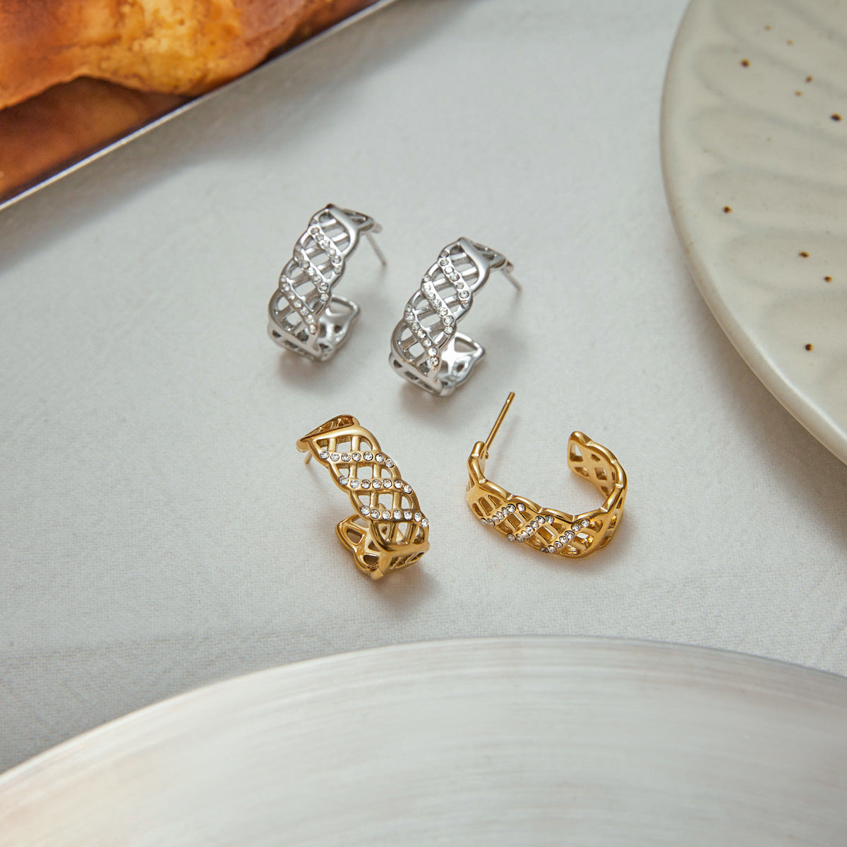 Crystal Lattice Earrings in silver and gold with zirconia crystals, showcasing intricate lattice design and modern elegance.
