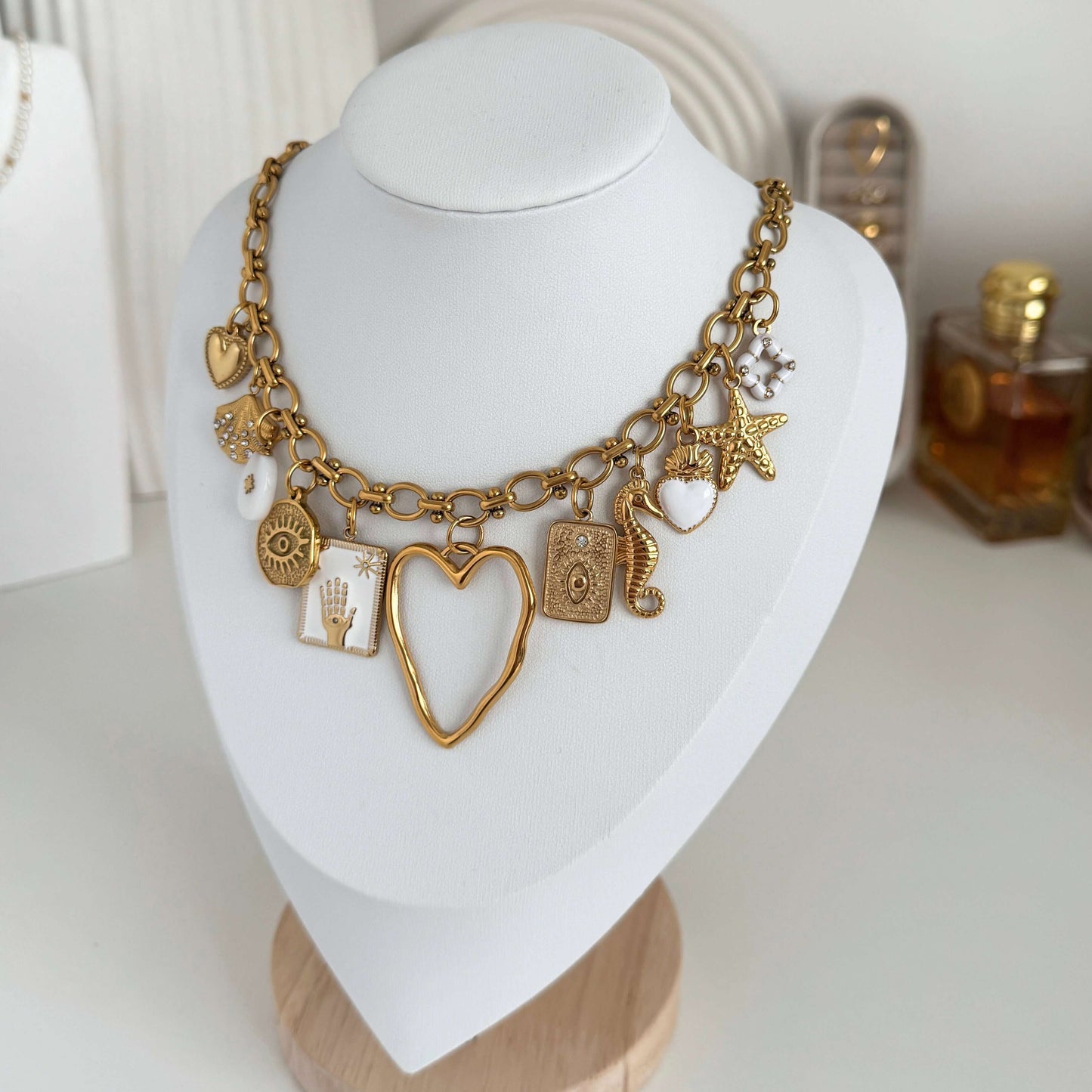 White and gold multi charm necklace by Kataleya Jewellery