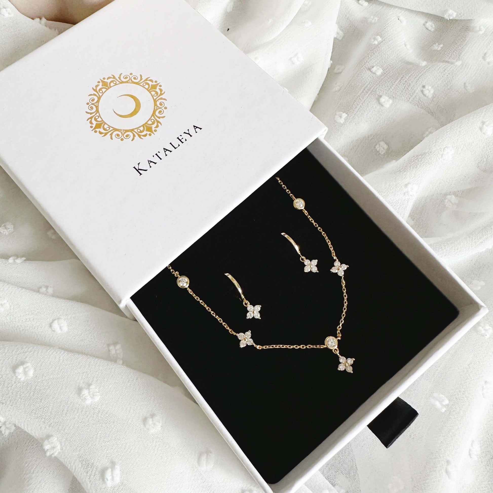 Diana Flower Charm Necklace in elegant Kataleya gift box with sparkling cubic zirconia flowers.