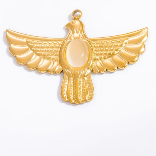 Gold bird-shaped charm on a white background - Kataleya Jewellery