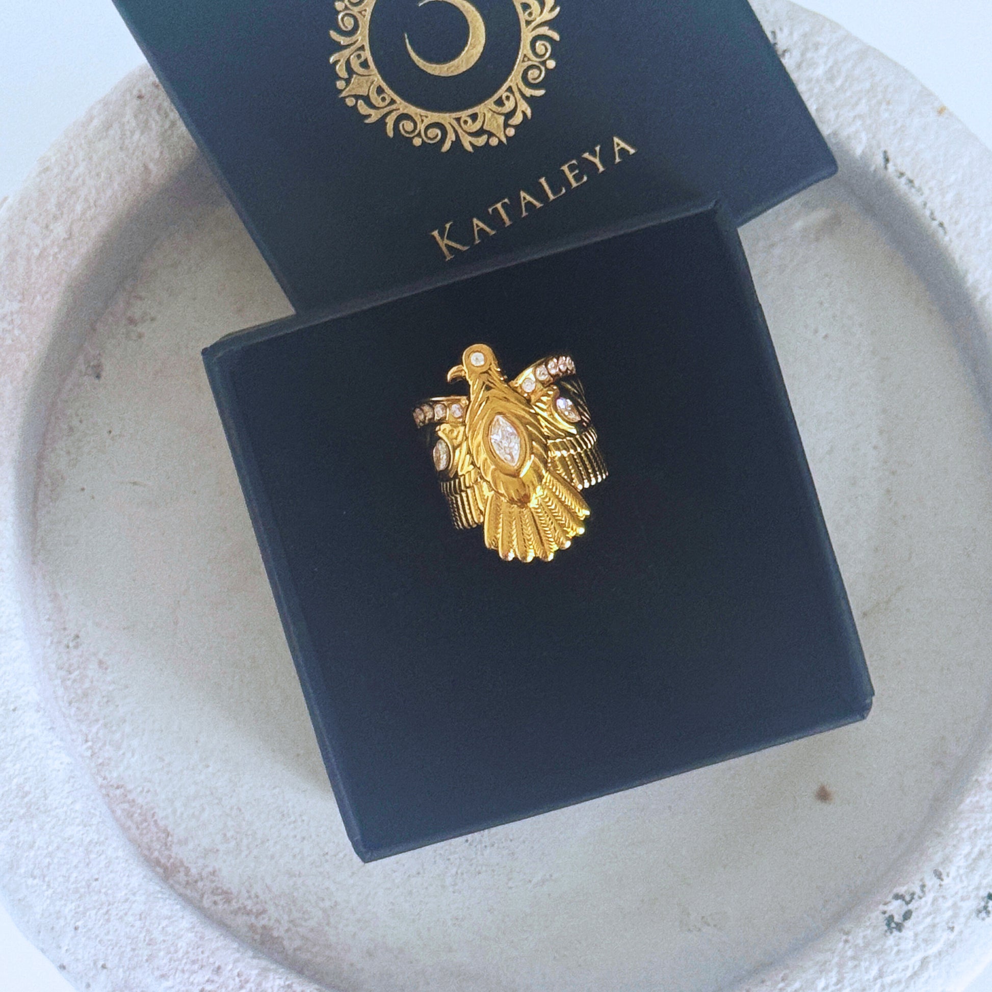 Nekhbet eagle statement ring displayed in elegant packaging, showcasing its bold design and craftsmanship.