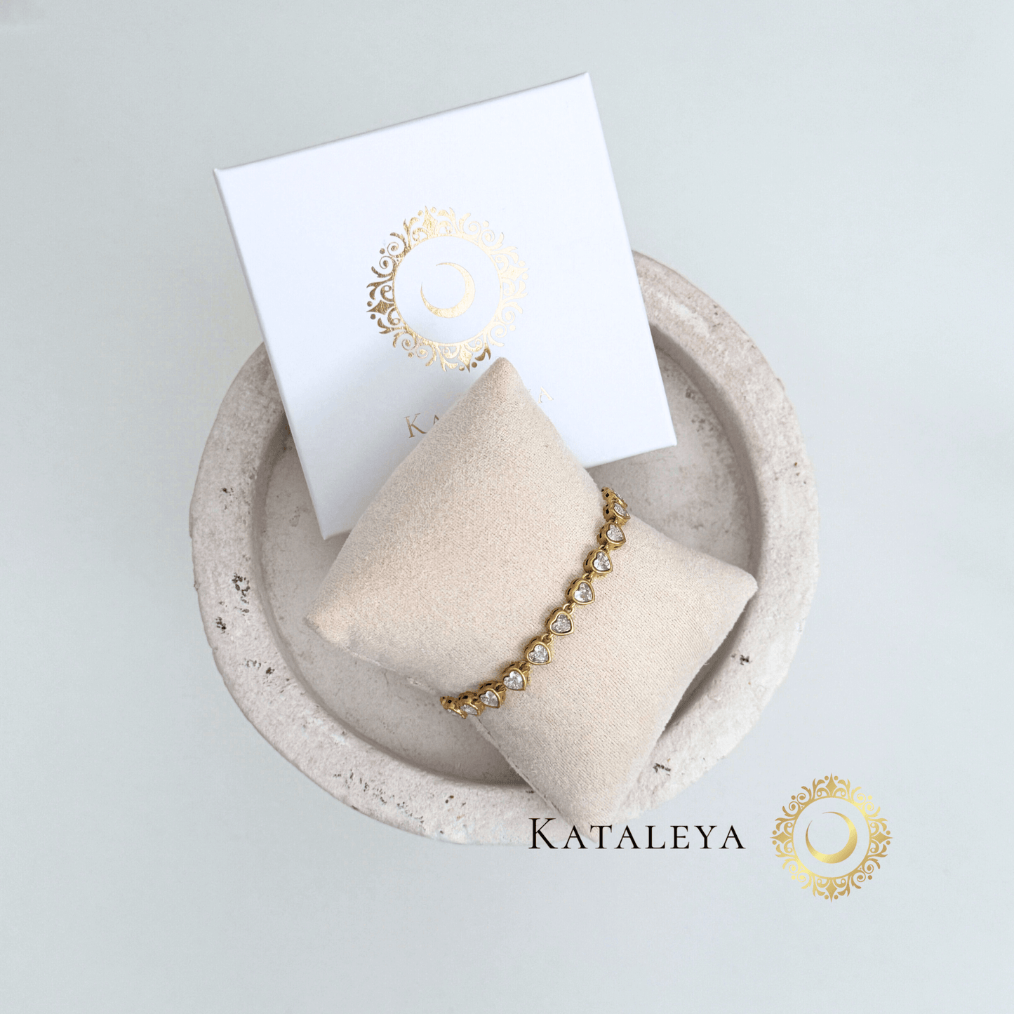 Heart Tennis Bracelet displayed on a soft cushion with a premium packaging for elegance and style.