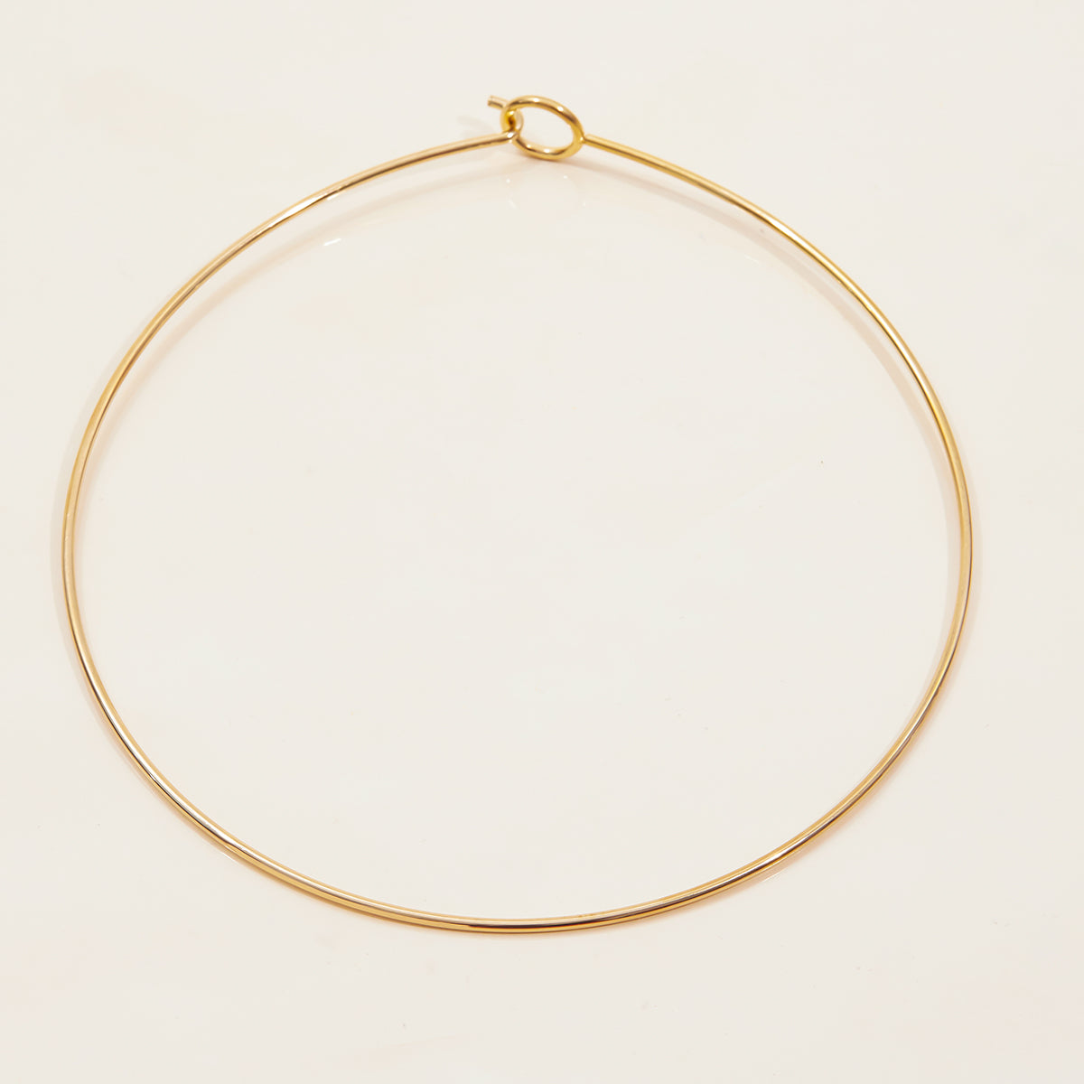 Minimalist Wire Choker in gold, designed for a sleek and simple look, waterproof and tarnish-free.